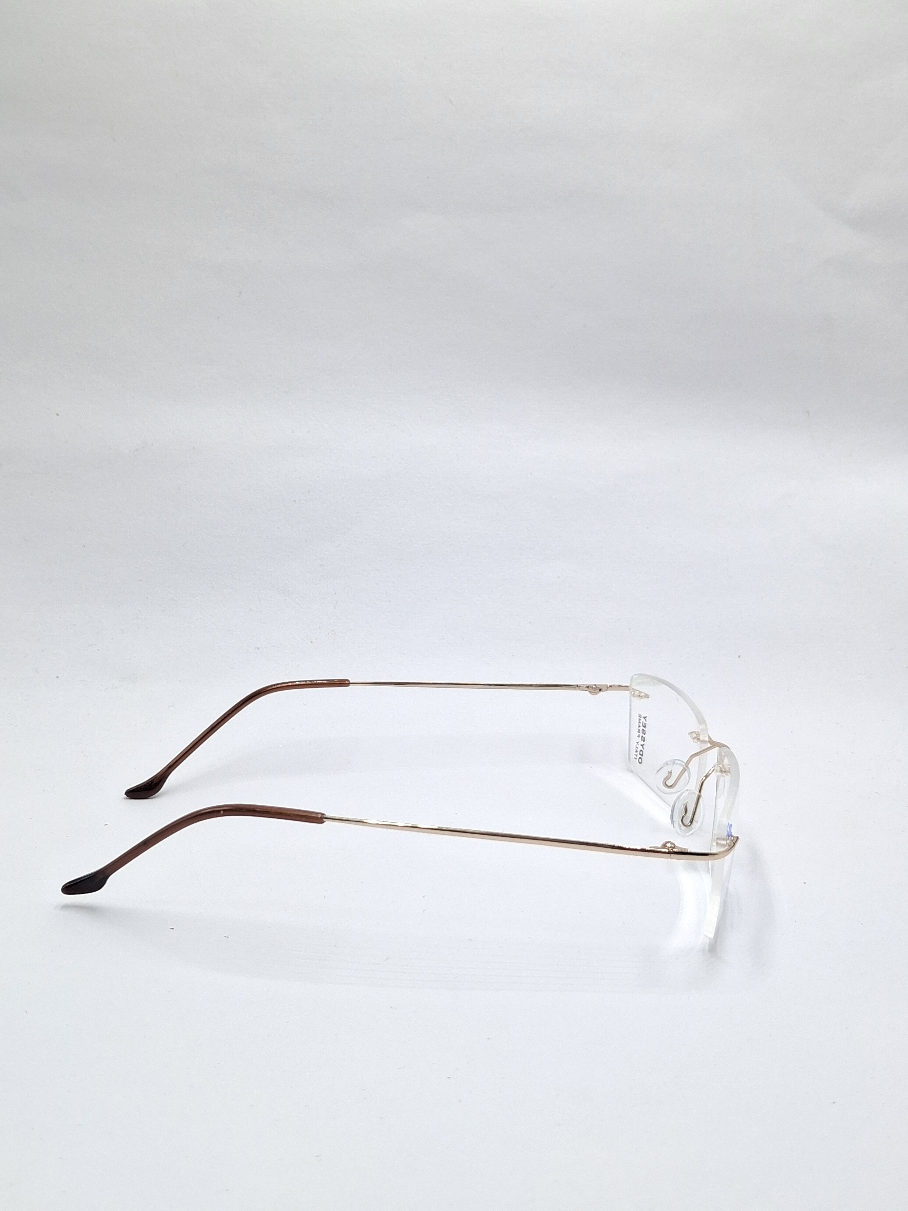 vision plus gold and brown frame less frame