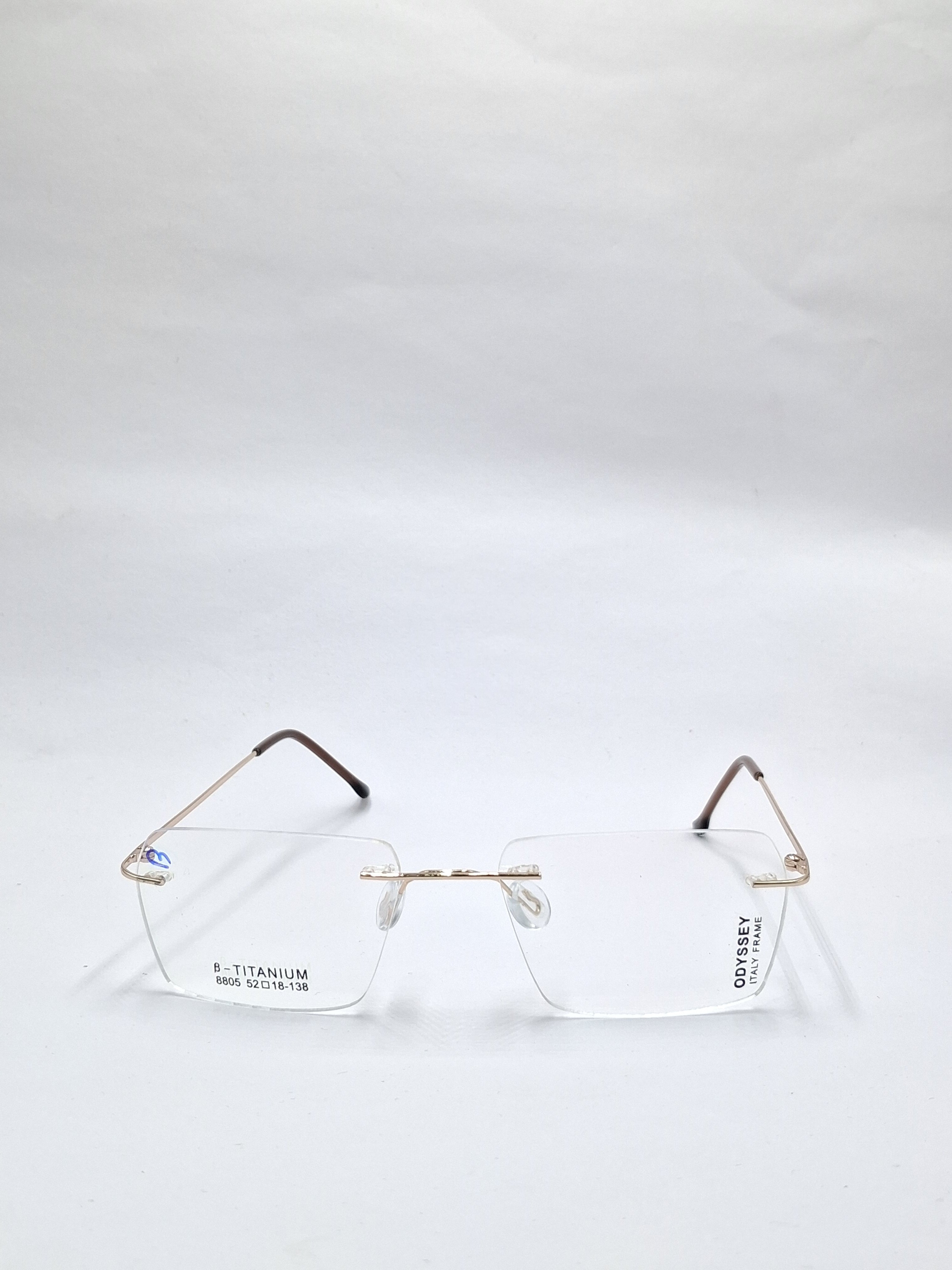 vision plus gold and brown frame less frame