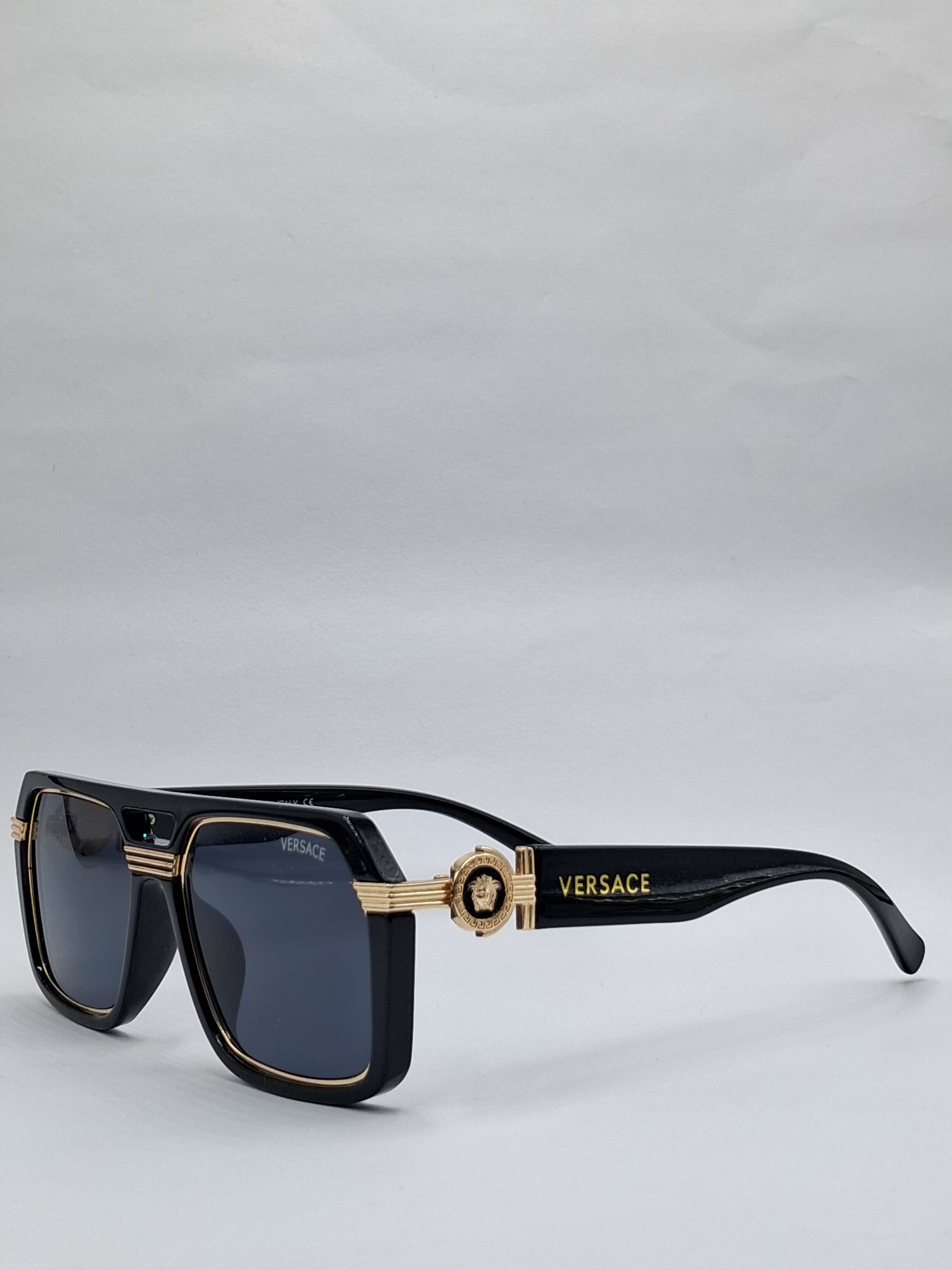 vision plus black and gold sunglasses