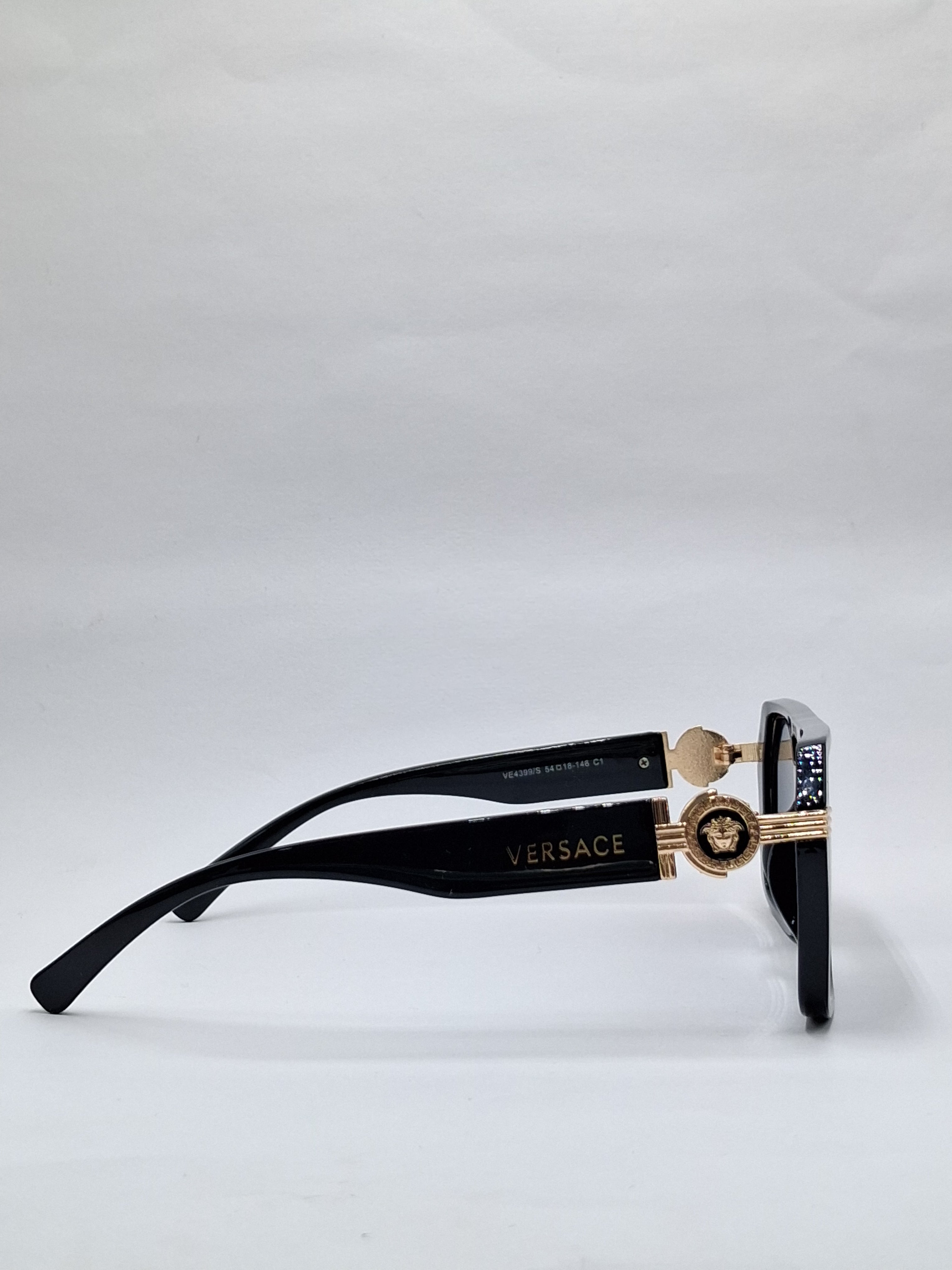 vision plus black and gold sunglasses
